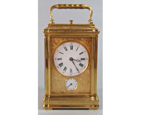 A brass carriage clock by&nbsp;Le Roy et Fils with Parisian address, with alarm and repeat, the circular enamel dial within a