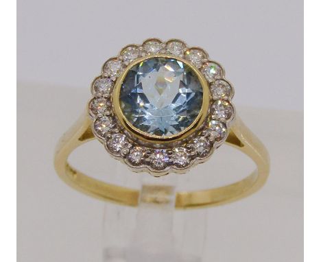18ct aquamarine and diamond daisy cluster ring, maker 'JC', Birmingham, size M/N, 3.2g 