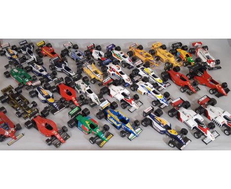 Collection of 31 models by Burago, all 1:24 scale Formula 1 cars, unboxed 