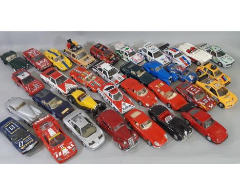 35 classic and sporting model cars by Burago, all 1:24 scale including Bugatti, Ferrari, Jaguar, Alpha Romeo, unboxed (35) 