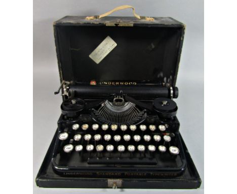 An underwood portable typewriter with handbook and original receipt for £12 Guineas 30/6/1926 