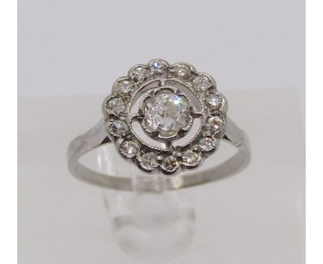 950 platinum diamond daisy cluster ring, centre stone 0.35ct approx, size N, 3.7g 