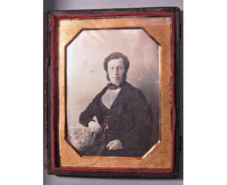 John William Newland daguerreotype portrait, 6 Loudons Buildings, Calcutta, the portrait of a young man seated, his arm resti