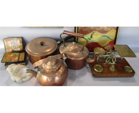 A miscellaneous collection of items including two copper kettles, a copper saucepan, a leather waste paper bin, postal weighi