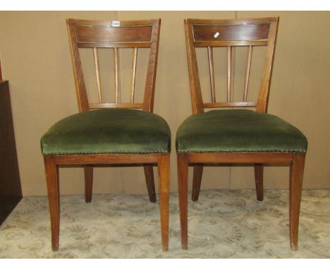 A set of six 19th century stick back chairs in elm with brass inlay, upholstered seats on swept supports together with a furt