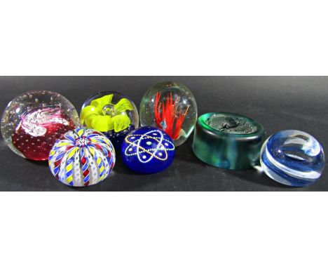 Seven paperweights, including a 50th Anniversary of the Battle of Britain, limited edition, 170/2000 , a Caithness example, a
