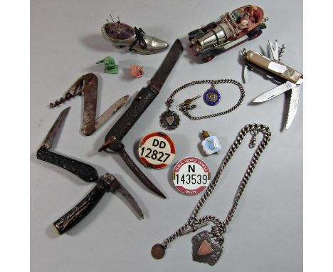 A heavy silver watch chain and fob, five vintage pen knives, Queen Anne silver sixpence, 1708, a Corgi model of Chitty Chitty