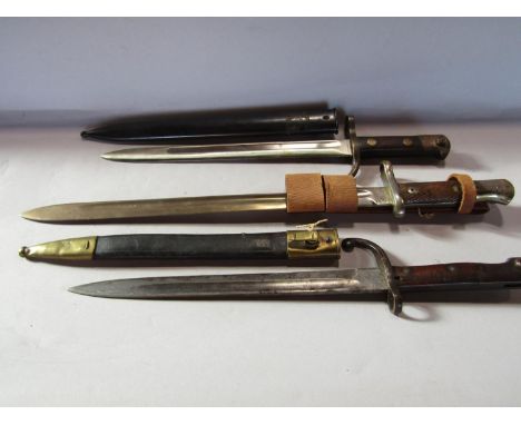 A Hackman &amp; Co Finnish bayonet, circa 1930’s , complete with scabbard, an Alex Coppel German bayonet, complete with leath