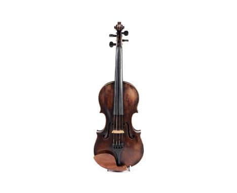 A violin in the manner of Joseph Guarneri, with two-piece medium figured back and ribs, fine even-grained top, darkened amber