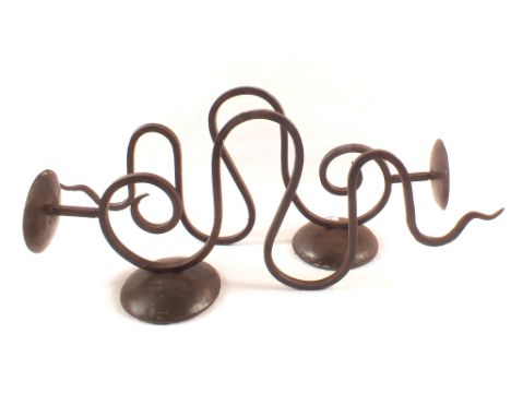 A pair or wrought iron wall candle holders, stoneware jars and a print of a girl with dog