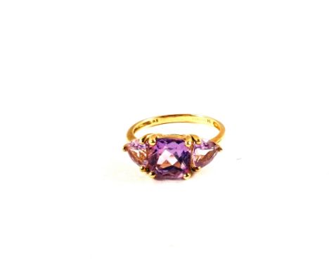 A 9ct Gold three stone Amethyst set ring, size P 1/2