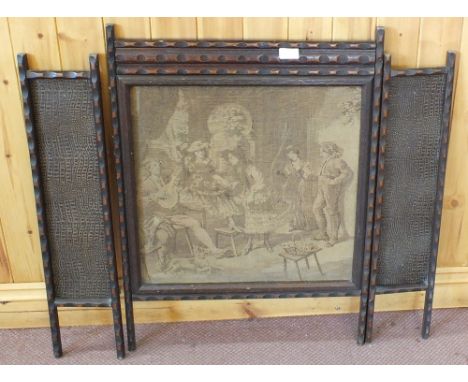 An Oak mirror and a tapestry firescreen