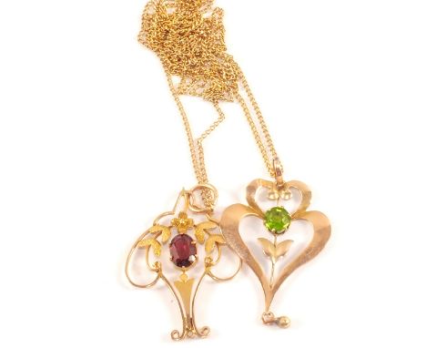 Two Gold Art Nouveau style pendants set with coloured stones each hung on a 9ct chain