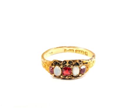 A 15ct Gold Opal and red stone set ring (repaired), size N