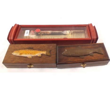 A modern Admiral Fitzroy barometer and two fly boxes, one containing flies
