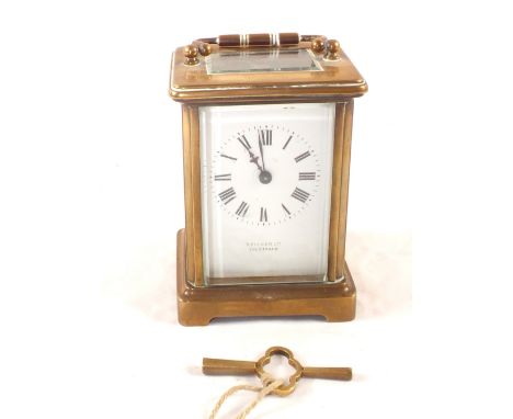 A Brass carriage clock, retail mark S.Fisher, Strand