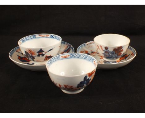 Two Lowestoft tea bowls and saucers plus a tea bowl (some damage)