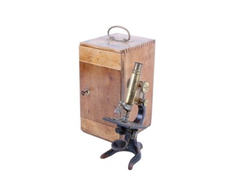 An E.Leitz Wetzlar brass monocular microscope. Serial number 128705. Stamped 'Z.L.B.U 9'. With Leitz 3 and 6 objective lenses