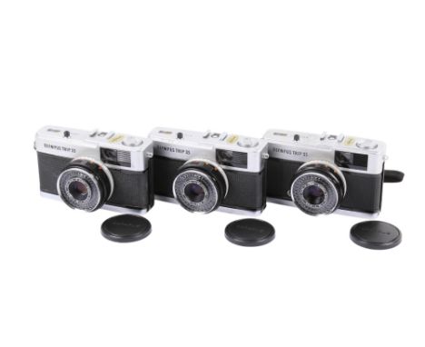 Three Olympus Trip 35 35mm Viewfinder cameras. Each with Olympus 40mm f2.8 lenses, lens caps and pouches. Shutters and 'red f