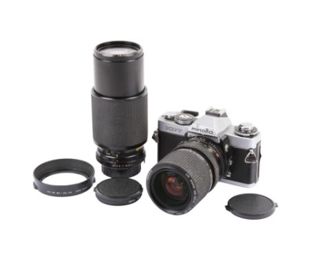 A Minolta XD7 35mm SLR camera outfit. Chrome. With two lenses; a Minolta MD Zoom 28-85mm f3.5-4.5, and a Vivitar 80-200mm f4.