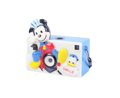 A vintage novelty 35mm Walt Disney point and shoot camera. Made by Helm Toy Corp. Blue, Featuring Micky Mouse riding a train,