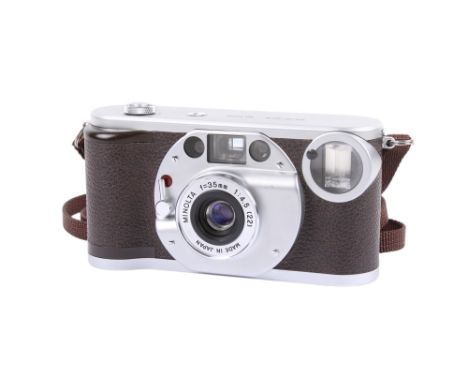A Minolta PROD-20'S 35mm compact camera. Serial number 14084. With a Minolta 35mm f4.5 lens. Shutter and flash working.