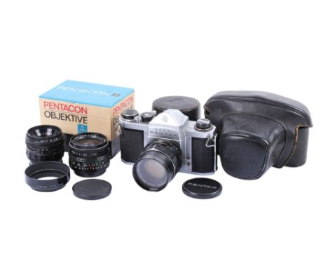 An Asahi Pentax S1a 35mm SLR camera outfit. with three lenses; an Asahi 55mm f2 Super-Takumar, a Rolmax 35mm f3.5, and a Pent