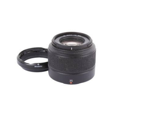 A Fujifilm 35mm f2 XC Fujinon Aspherical lens. Optics VG. Missing caps.