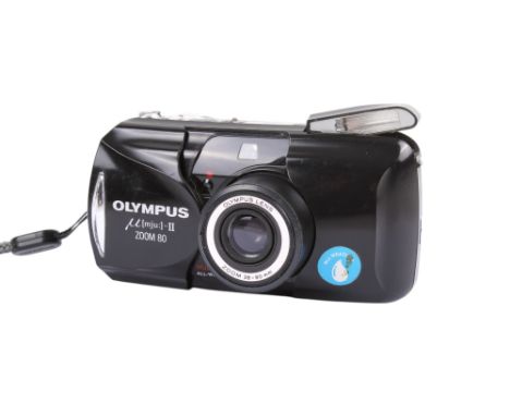 An Olympus MJU II Zoom 80 35mm Compact camera. Black. Serial number 5037132. With an Olympus 38-80mm Zoom lens. Powers on, sh