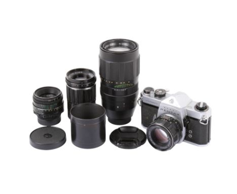 An Asahi Pentax Spotmatic 35mm SLR camera outfit. Chrome. Serial number 2508472. With four lenses; an Asahi 55mm f1.8 SMC Tak