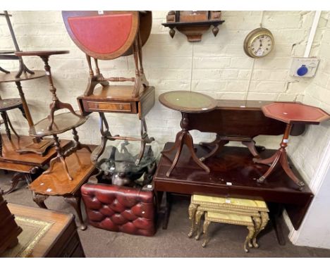 Buttoned leather footstool, winged cherub coffee table, nest of three onyx tables, low sofa table and eight occasional tables