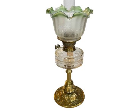 Art Nouveau brass and glass oil lamp with etched frosted green tinted glass shade, 60cm high.