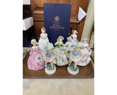 Seven Royal Worcester figures.
