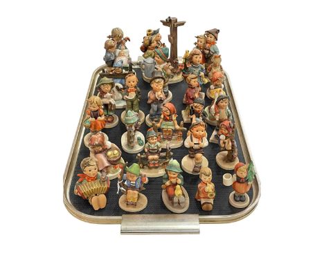 Collection of twenty six Hummel figures.