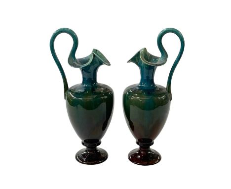 Pair of Linthorpe pottery ewers, shape number 1936, 29cm.