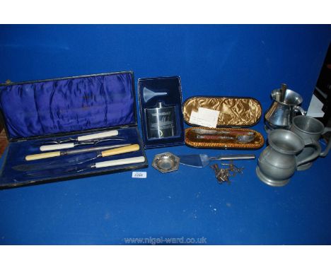 A quantity of plated, Pewter and white metal items including souvenir hip flask, tankards, carving set, serving spoon, etc.