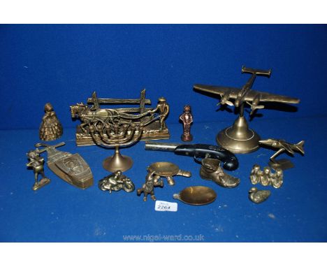 A quantity of small brass items including model planes