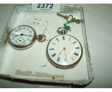 A fine Silver Victorian Fob Watch with Swiss cylinder movement date 1910 along with a small Trench Watch with a fifteen jewel