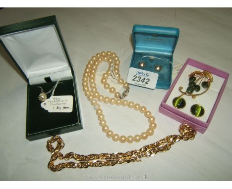 A gold coloured Link Bracelet, a pair of silver hallmarked pearl Earrings, a Pearl Necklace with 800 hallmark, a 925 silver N