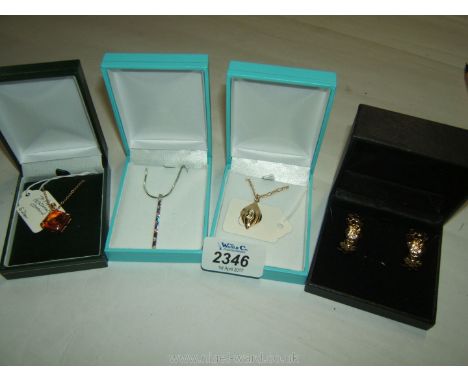 A Silver Pendant and chain with pink and white stones, a gold coloured 'Topaz' Pendant and chain along with a pair of gold co