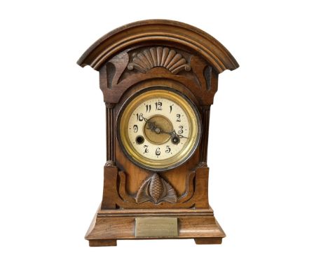German-Edwardian mahogany cased striking mantle clock, carved case with a two train spring driven movement.  With pendulum.