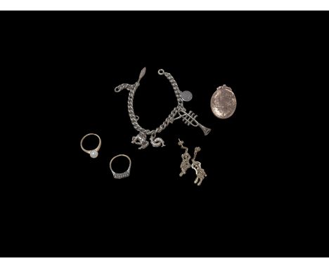 14ct gold pearl ring, 18ct and platinum stone set ring, silver charm bracelet, pair of 9ct gold earrings and a 9ct gold back 