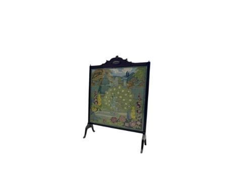 Needlework fire screen depicting a peacock