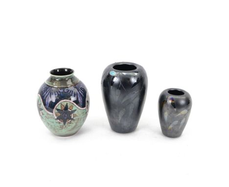 Poole Pottery vase decorated with stylised flowers on a mottle green ground, signed N Massarella to the base, together with t