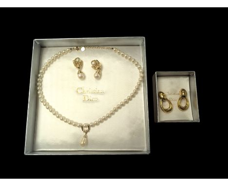 Pair of Christian Dior clip on hoop earrings, stamped Chr.Dior, together with a faux pearl necklace and similar clip on earri