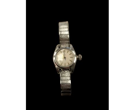 Ladies Tudor manual wind wristwatch on an expanding metal strapCondition Report:Crown detached not currently fuctioning