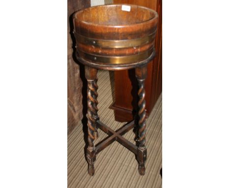 A COURT'S LTD OF LEICESTER STAVED SHALLOW PLANTER on barley twist four legged stand 
