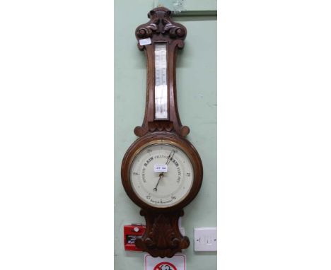 A 19TH CENTURY OAK BACKED BAROMETER THERMOMETER 