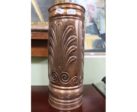 A DECORATIVE PRESSED COPPER STICK STAND 