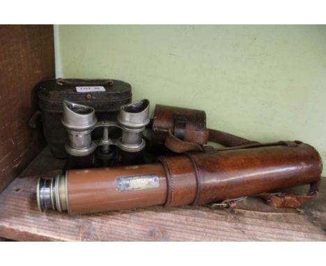 A CASED PAIR OF LEATHER COVERED BINOCULARS together with a leather cased telescope, titled 'The Lord Bury', by J.H. Steward L
